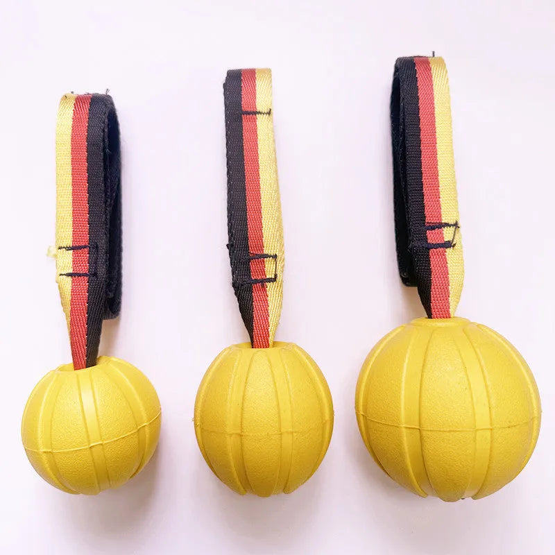 Floating EVA water training ball for dogs in camouflage and yellow colours showing different size options