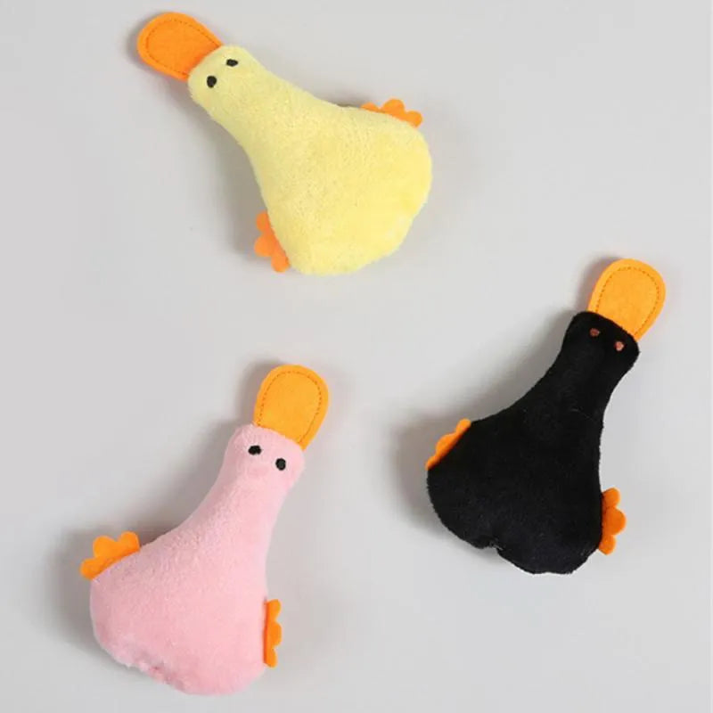 Colourful duck-shaped plush pet toy with catnip filling and internal squeaker for dogs and cats