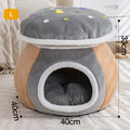 Purple mushroom-shaped cat nest bed with soft plush material and a separate blanket.