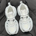 Polar Wave beige mesh platform sports shoes with a wedge heel and lace-up front.