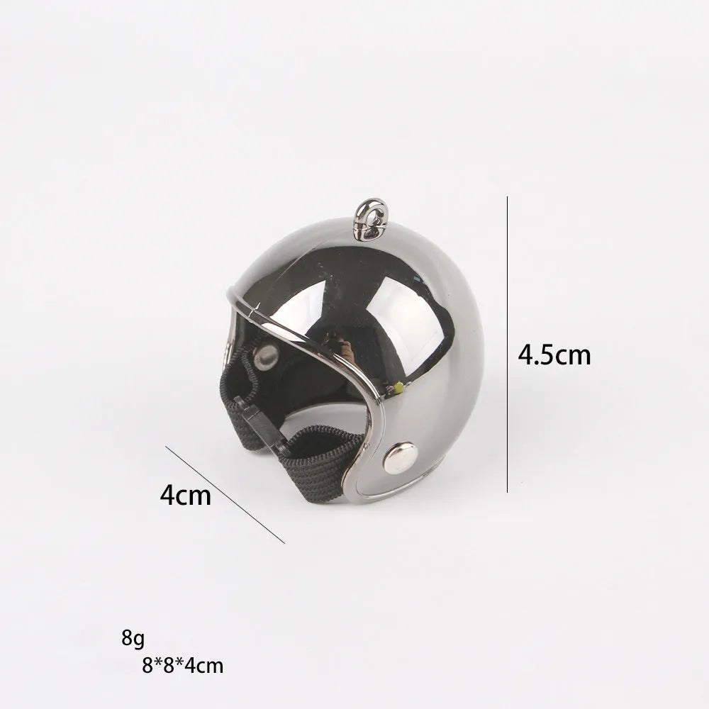 Small hard plastic helmet for a chicken with an elastic band and a soft interior sponge lining.