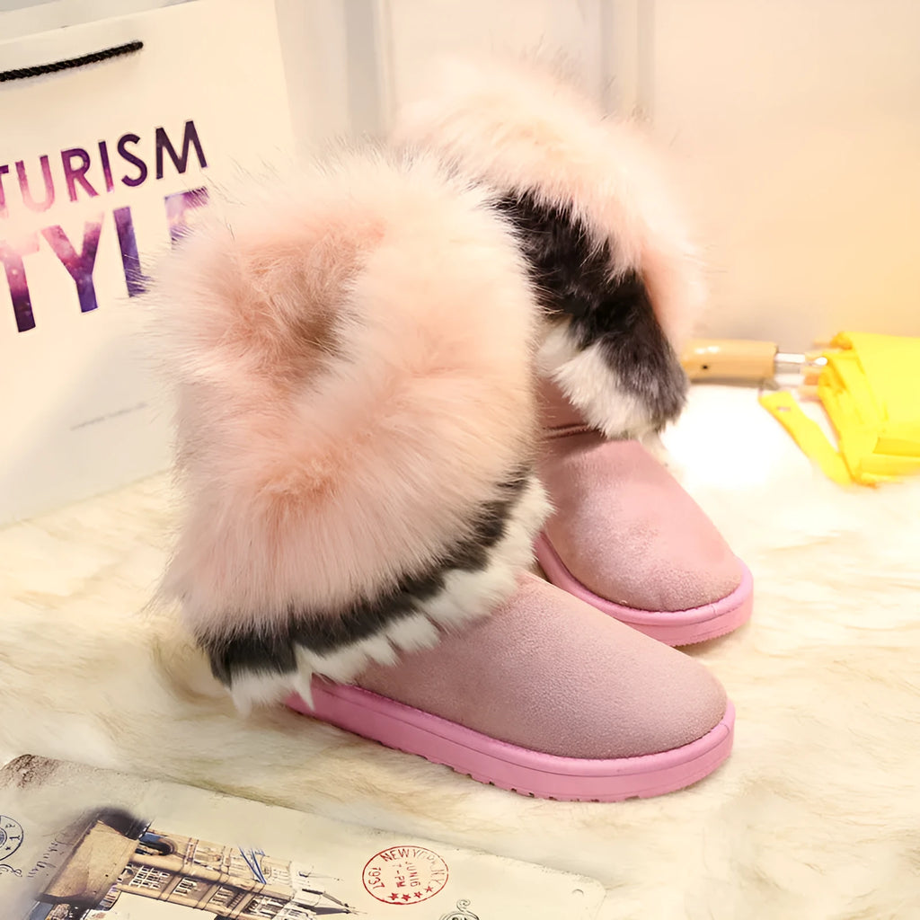 Women's winter snow boots with thick fluffy fox fur trim, non-slip rubber sole, and waterproof suede upper in colour options including black and green.