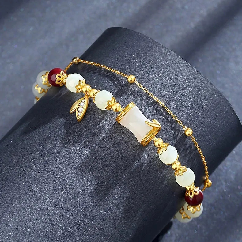 Bamboo special-design glass bracelet in beige with flower shape and Ruyi element, electroplated finish