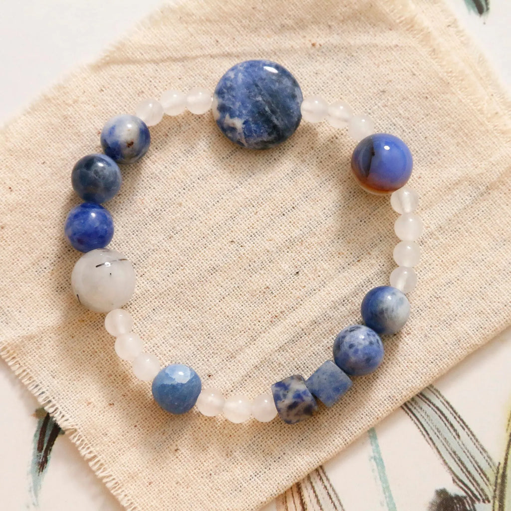 Natural blue point stone and black hair crystal agate hand-woven unisex bracelet with round and oval geometric beads