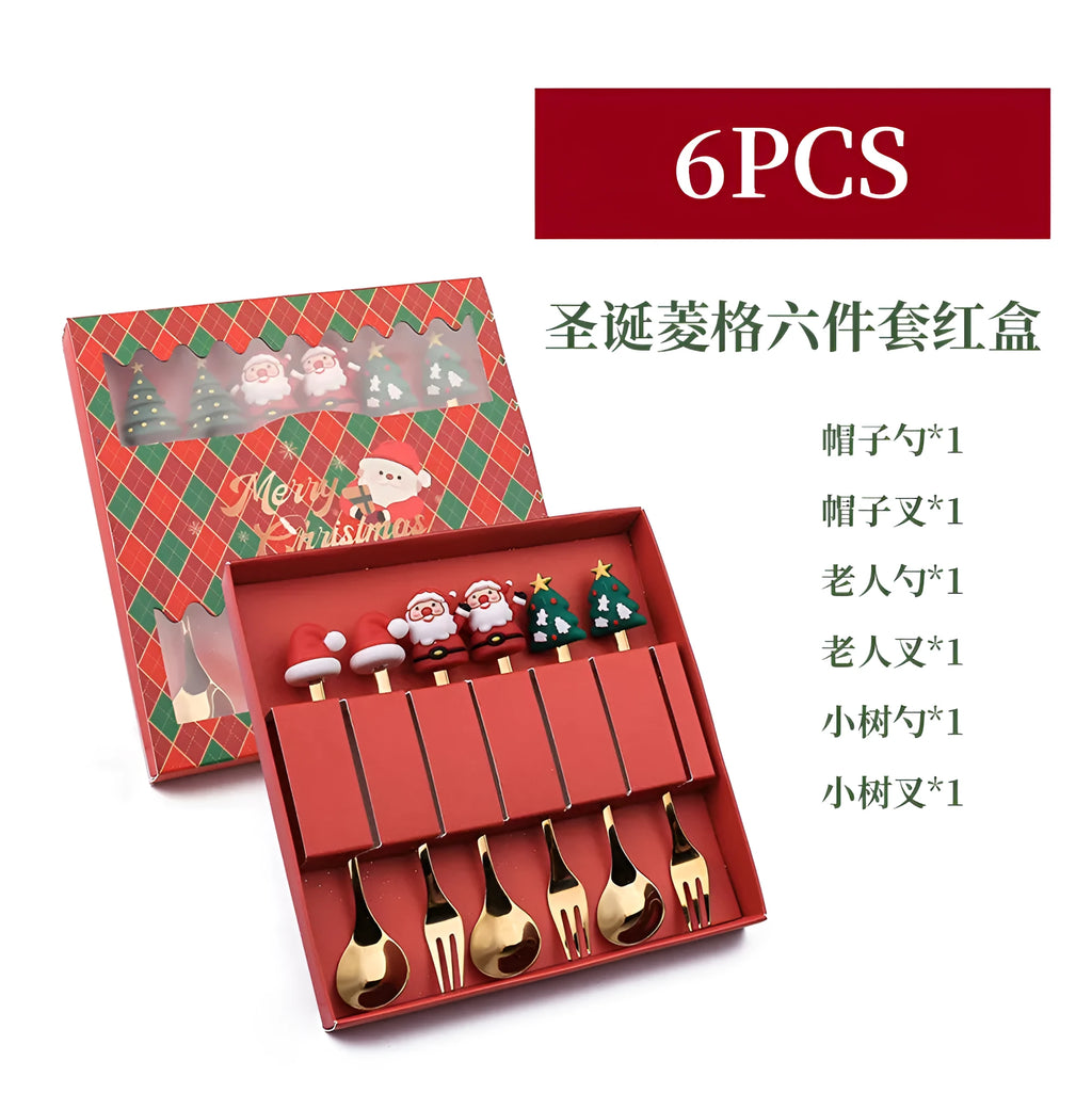 Four stainless steel Christmas spoons and forks with red handles showing Christmas tree and snowman designs on a white background