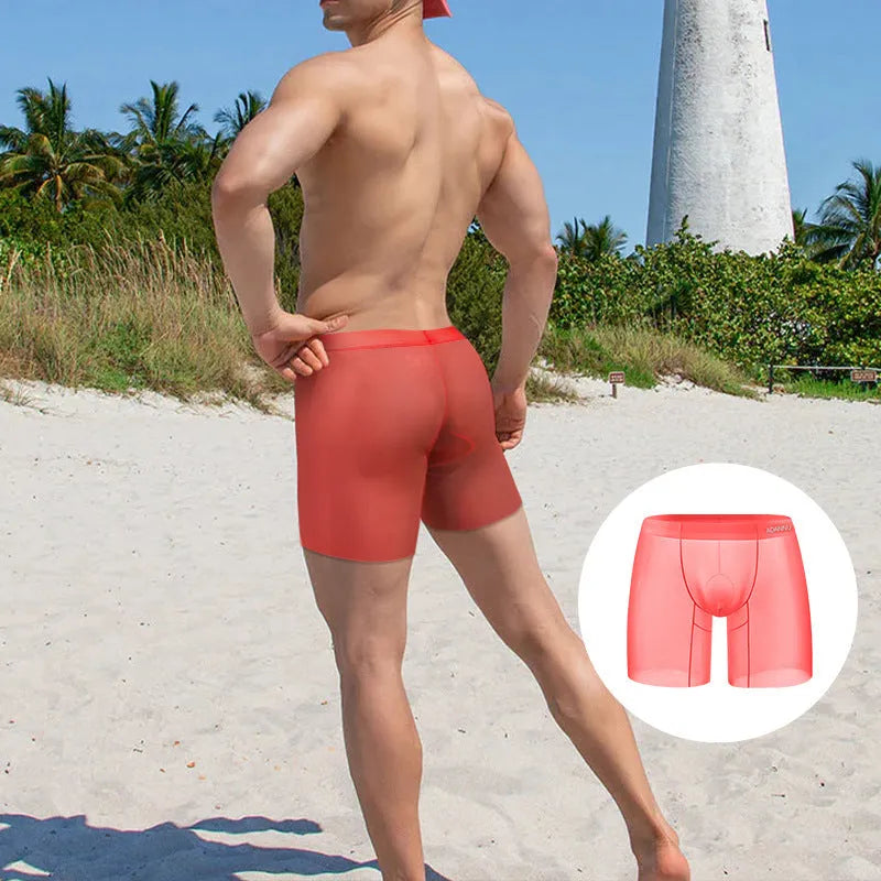 Men's low waist ice silk boxers in orange, pink, and red solid colours on a white background.