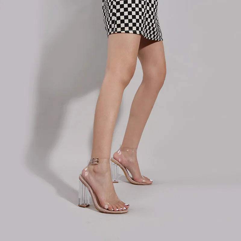 Apricot women's high heel sandals with glass heel and buckle strap on melamine sole.