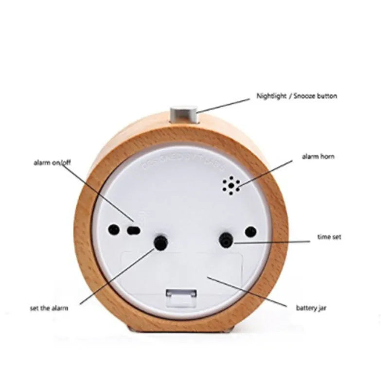 Solid beech wood silent snooze alarm clock showing wooden case and white dial.