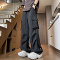 Plus size women's thin waterproof loose trousers in black, grey, and white.