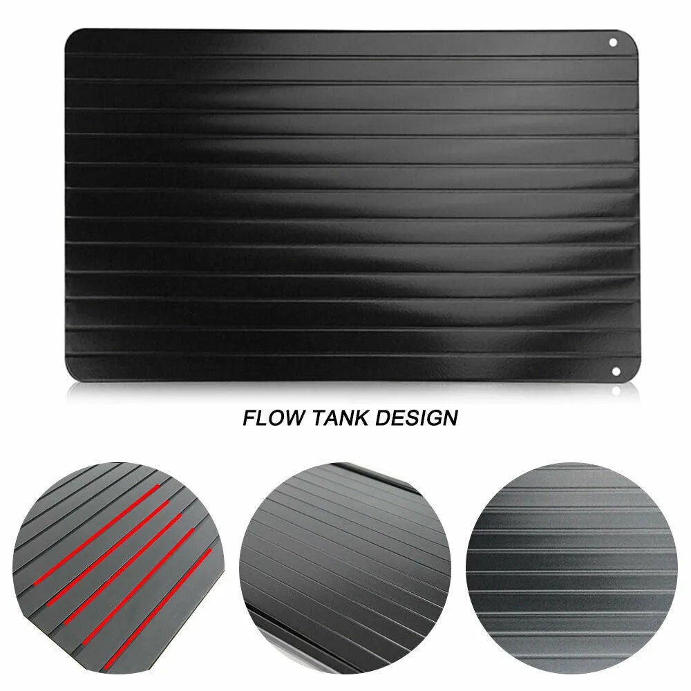 Black aluminium fast defrost tray 23x16.5cm on a countertop