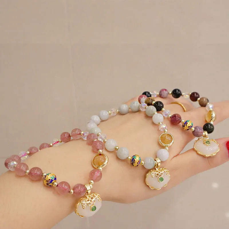 Geometric women's bracelet in gray jade and strawberry quartz with metal ethnic decoration