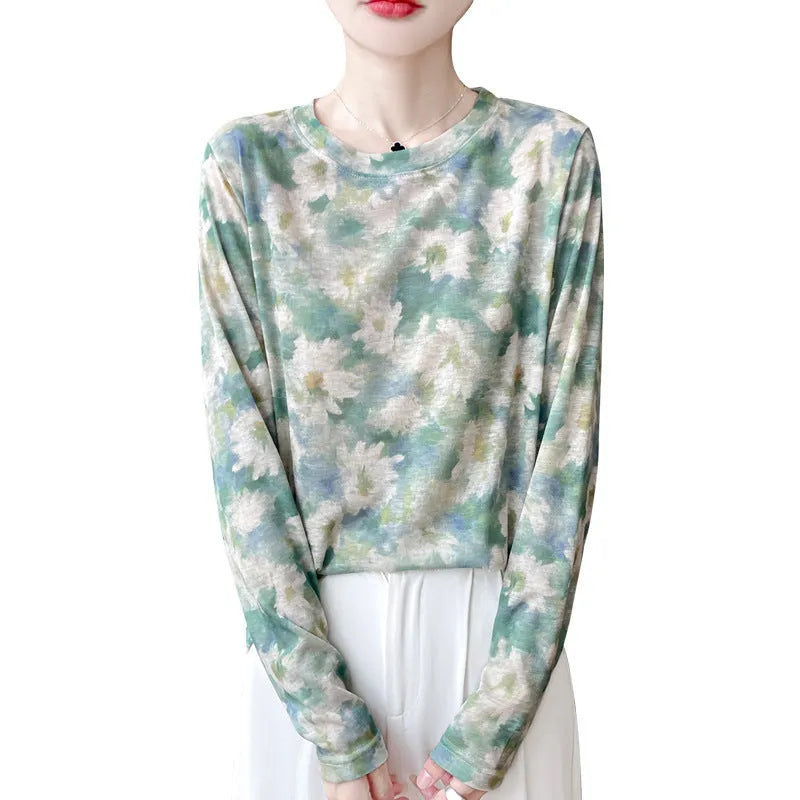 Ladies' round neck pullover shirt with floral printed design in Tencel cotton knit fabric.