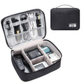 Black travel electronics organiser case with mesh pockets, elastic loops and removable padded dividers