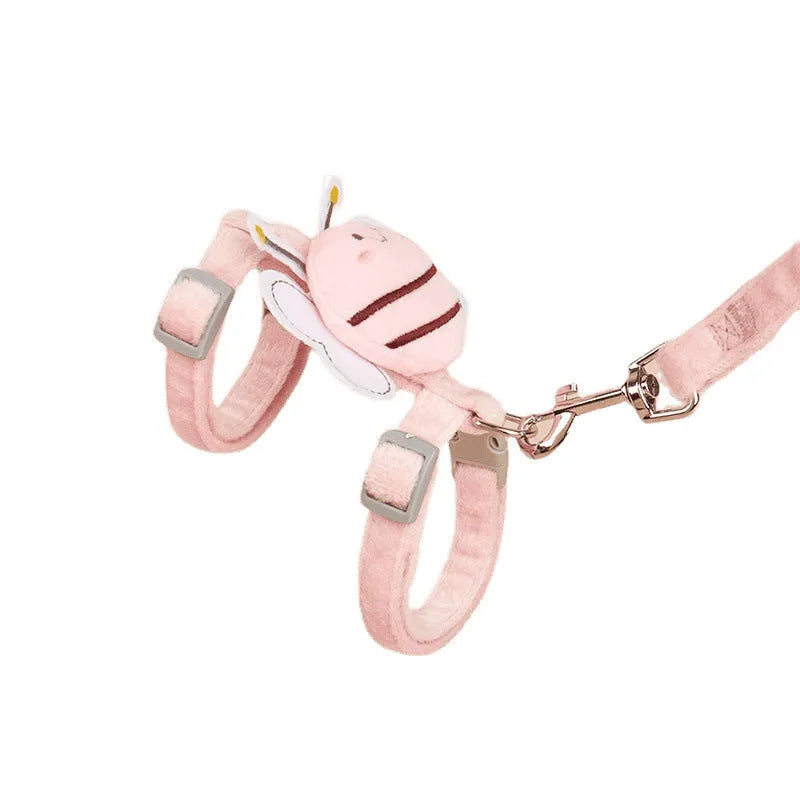 Bee-shaped pink cat collar and lead set for walking, shown with hand-held rope.