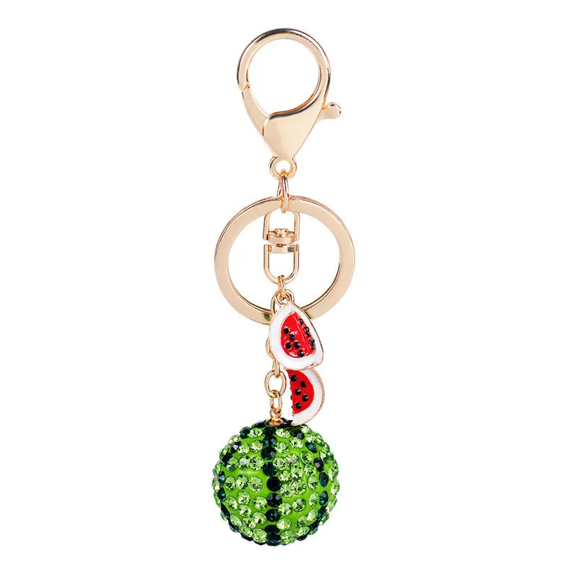 Green zinc alloy watermelon shaped keychain measuring 12cm with detailed fruit design