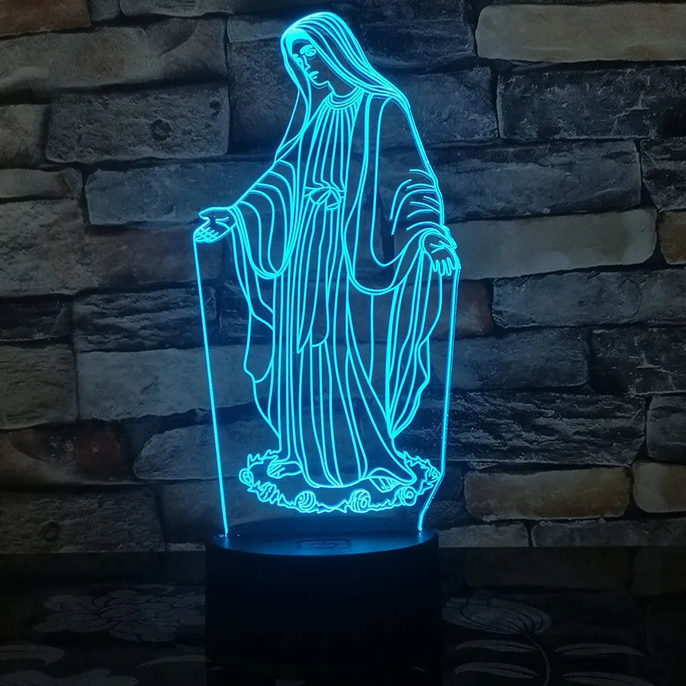 3D LED night light showing colourful dual ring pattern, with remote control and USB cable.
