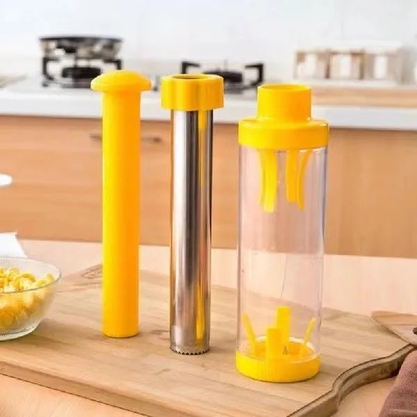 Yellow manual corn stripper with cylindrical ABS plastic body and stainless steel cutting surface on white background