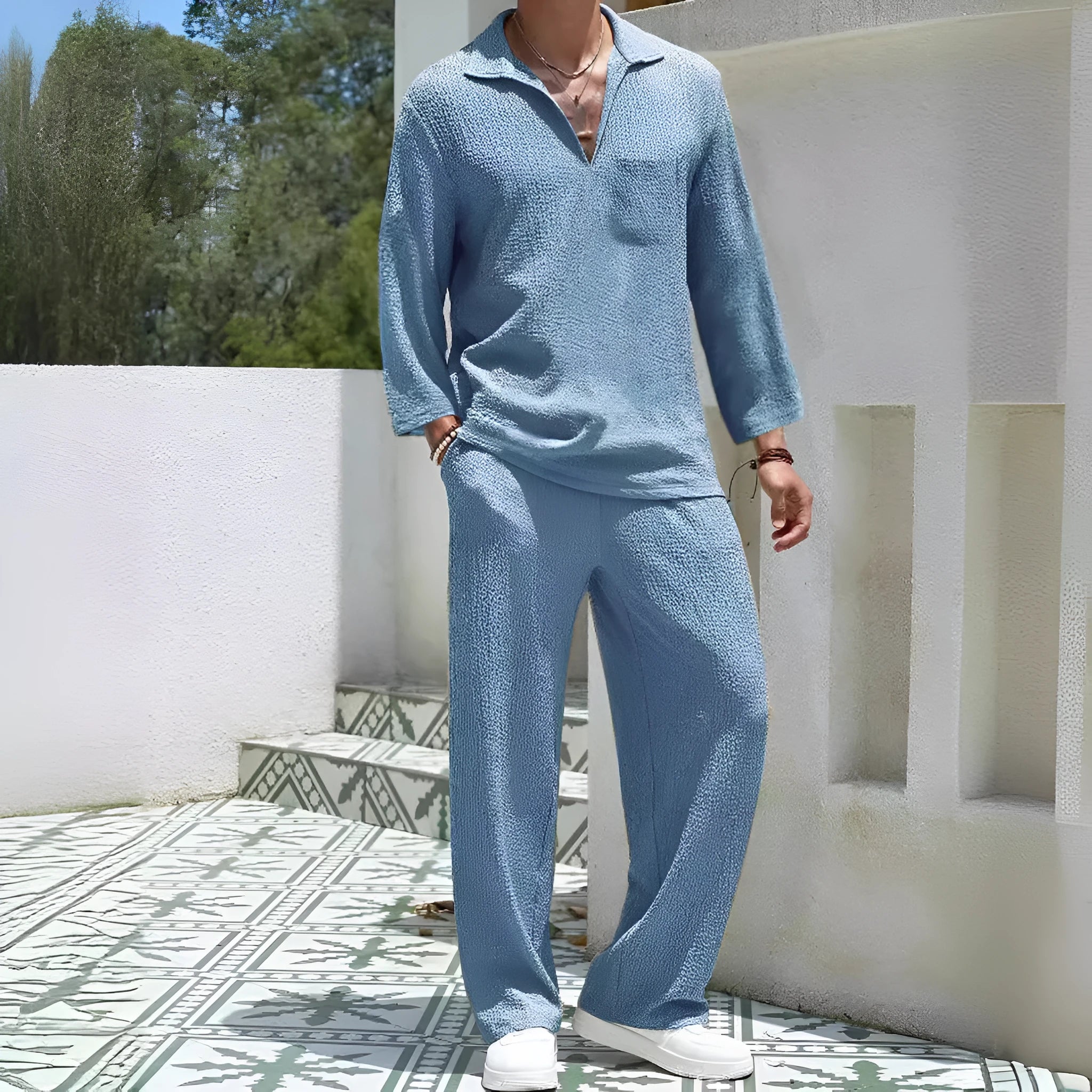 Men's casual shirt and trousers suit in polyester fabric, shown in one of four colours: lake blue, khaki, black, or caramel.