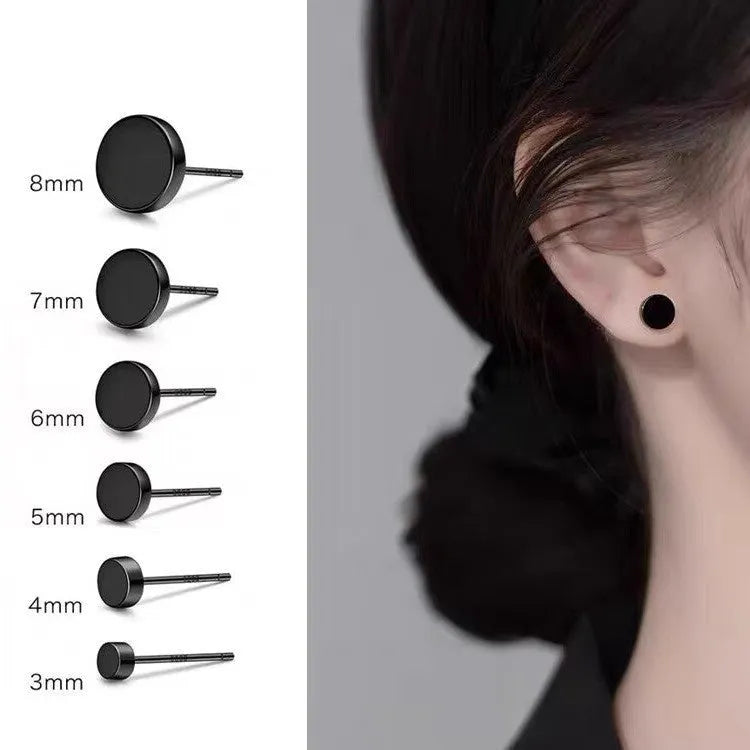 A pair of simple round flat S999 Sterling Silver ear bone studs for cartilage piercing.