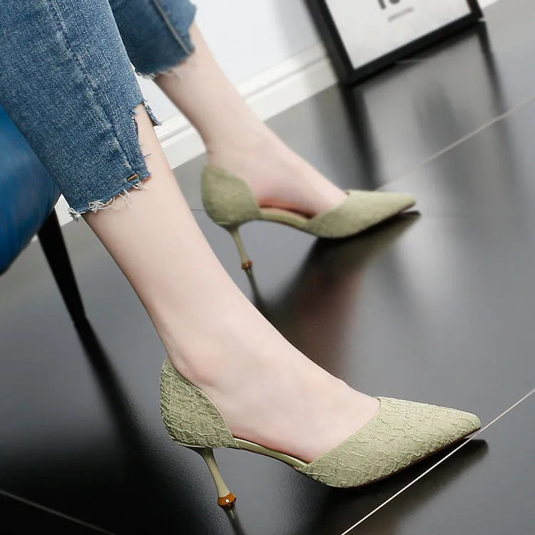 Black pointed toe stiletto high heel shoes with a PU upper and leather detail.