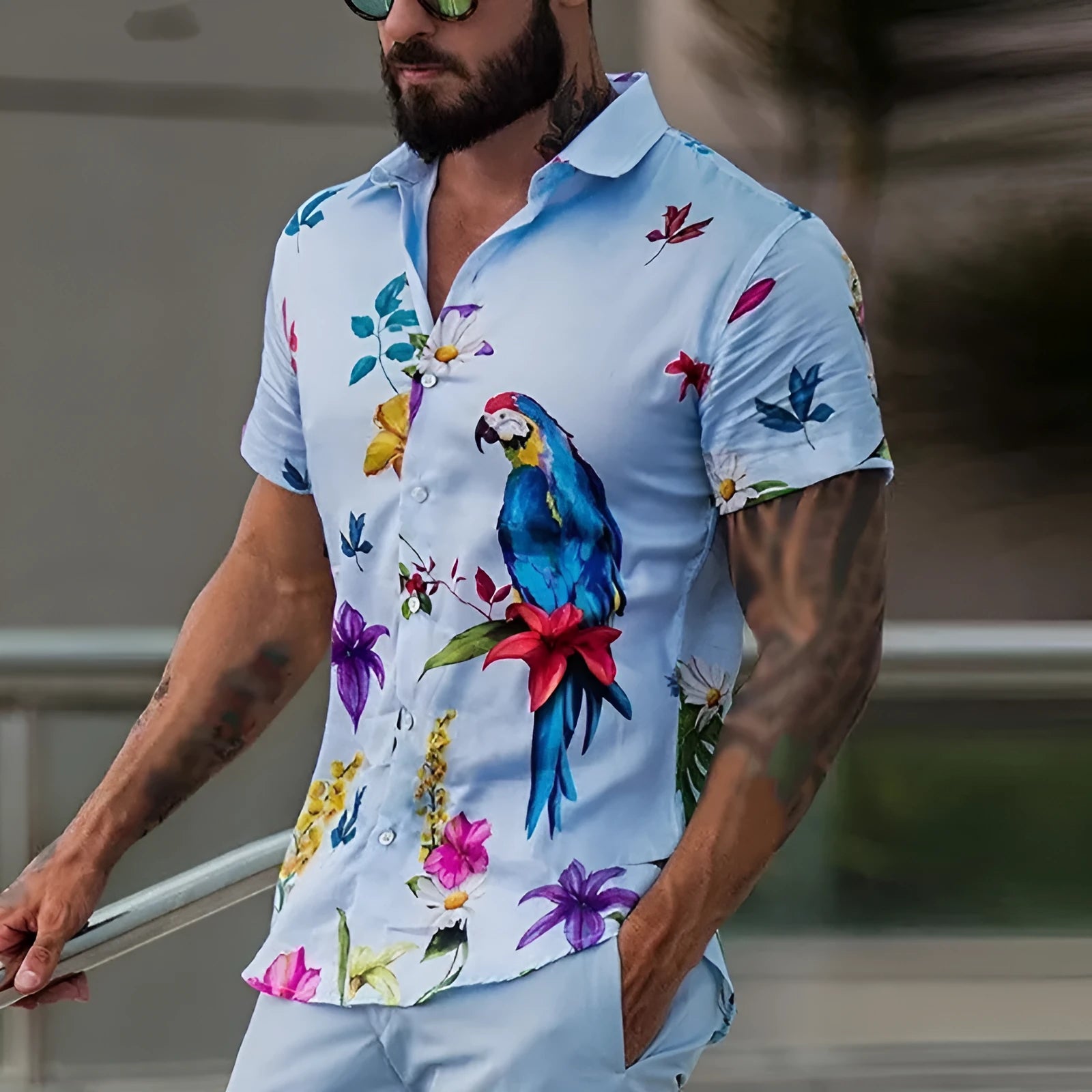 Men's blue short sleeve Hawaiian shirt with pointed collar on beach