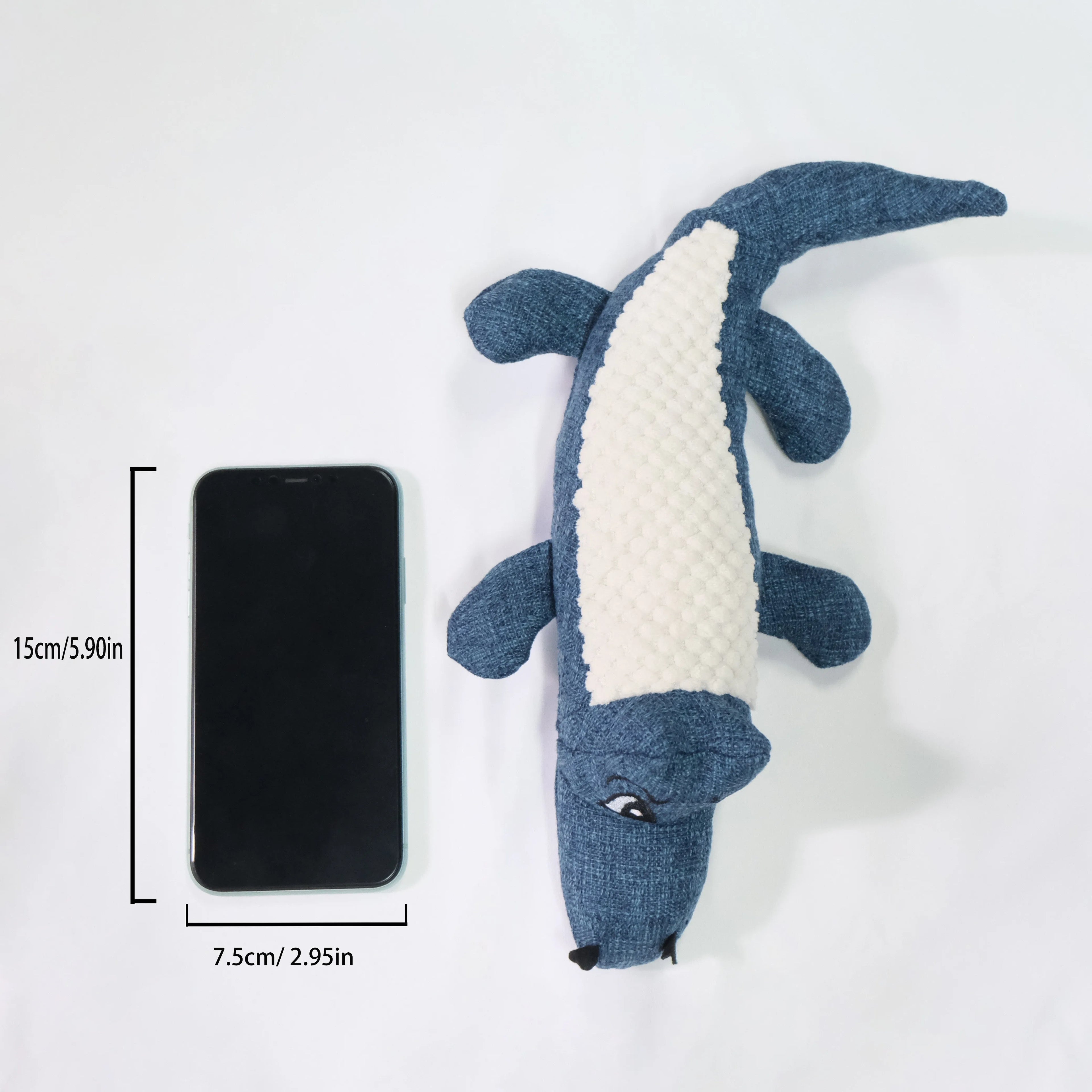 Corn grid pattern pet plush toy in blue, green or red colours with biting sound feature