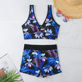 Women's two-piece swimsuit set with printed boxer briefs and sleeveless top in a multi-colour pattern.