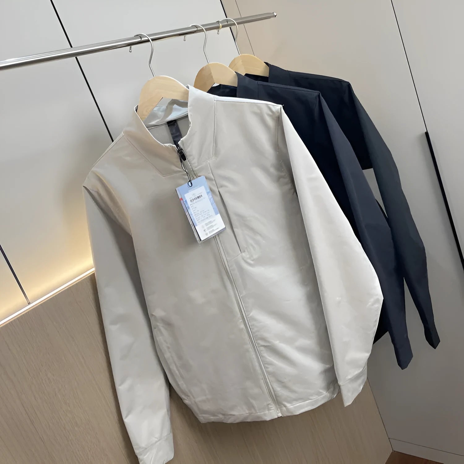 Men's stand collar sports casual jacket in polyester fiber, black colour, straight hem, long sleeves