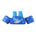 Child wearing a cartoon-themed swimsuit with integrated arm swimming rings for water safety.