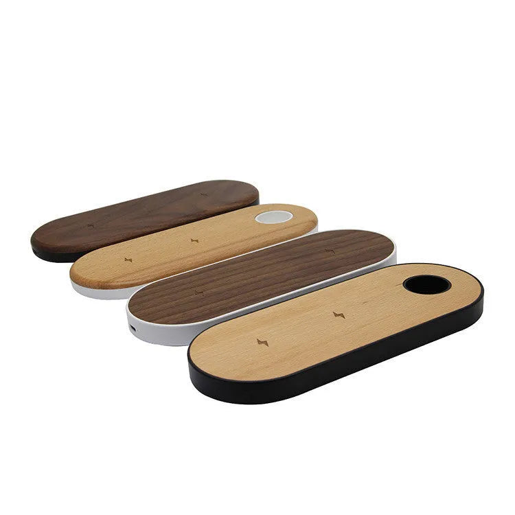 Wooden wireless charger with natural bamboo surface and walnut edging on a desk