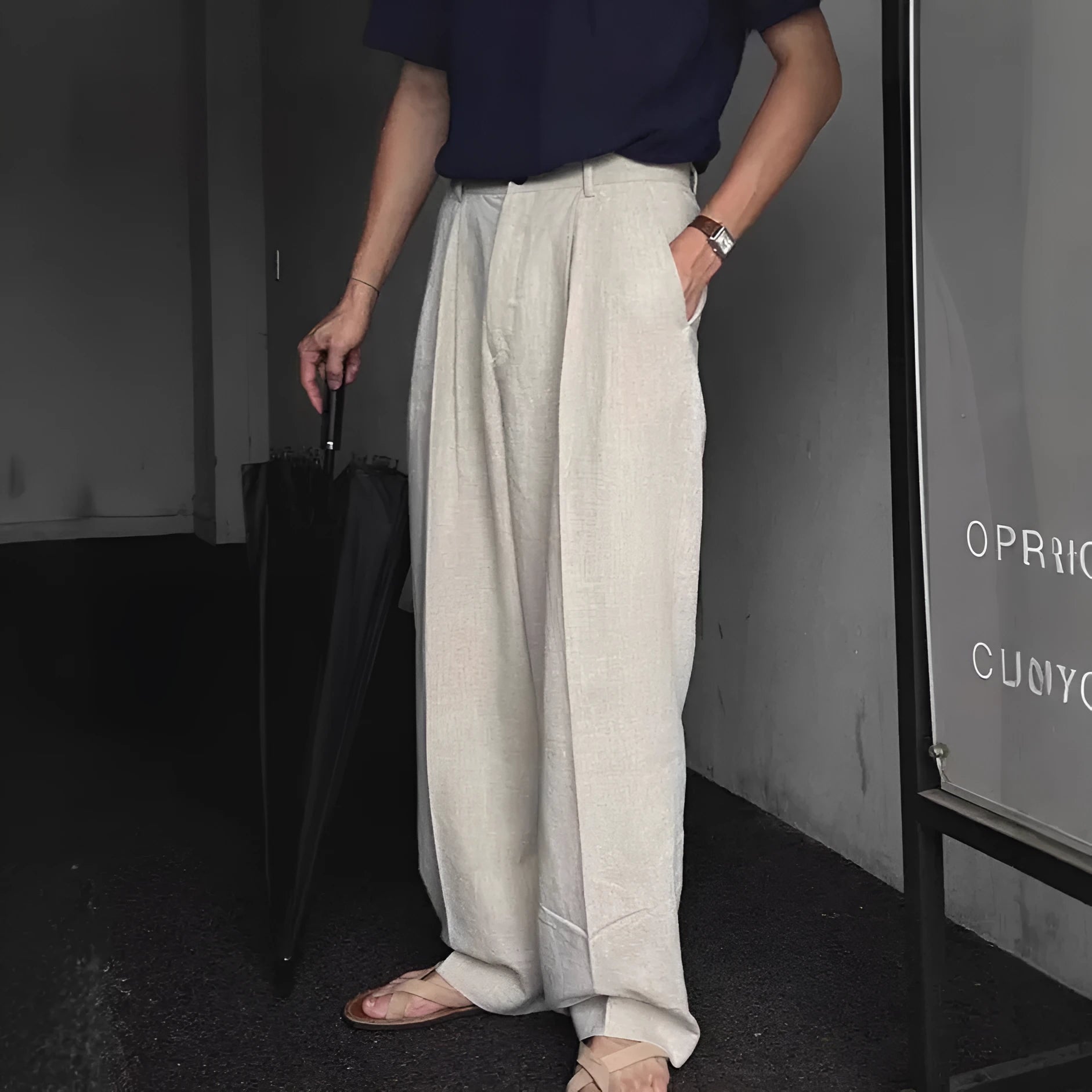 Men's loose fit cotton linen trousers in apricot, army green, and purplish blue, showing pencil leg opening.