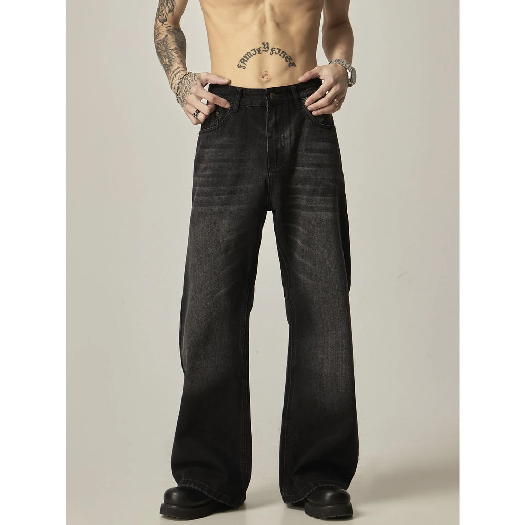 Men's black loose straight jeans with retro styling and zipper fly
