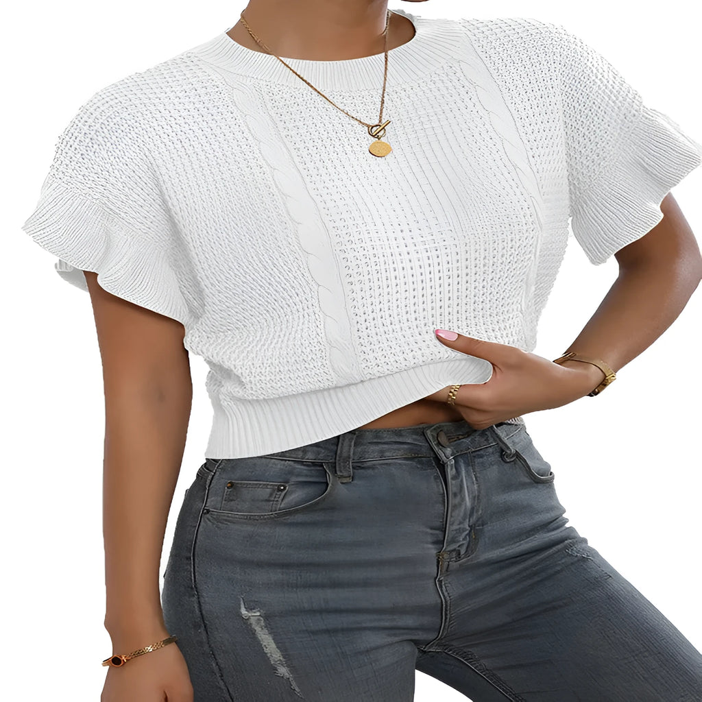 Loose fit knitted pullover with round neck and textured ruffled short sleeves in a neutral colour.