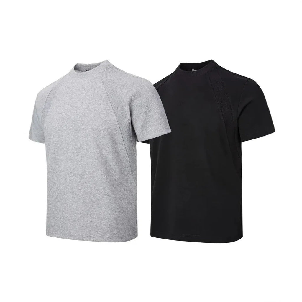 Men's black loose-fit short sleeve top with textured air layer stitching detail.