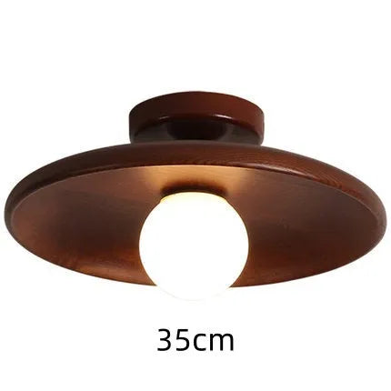 Modern solid wood ceiling lamp with glass shade in light wood and walnut colour finishes.