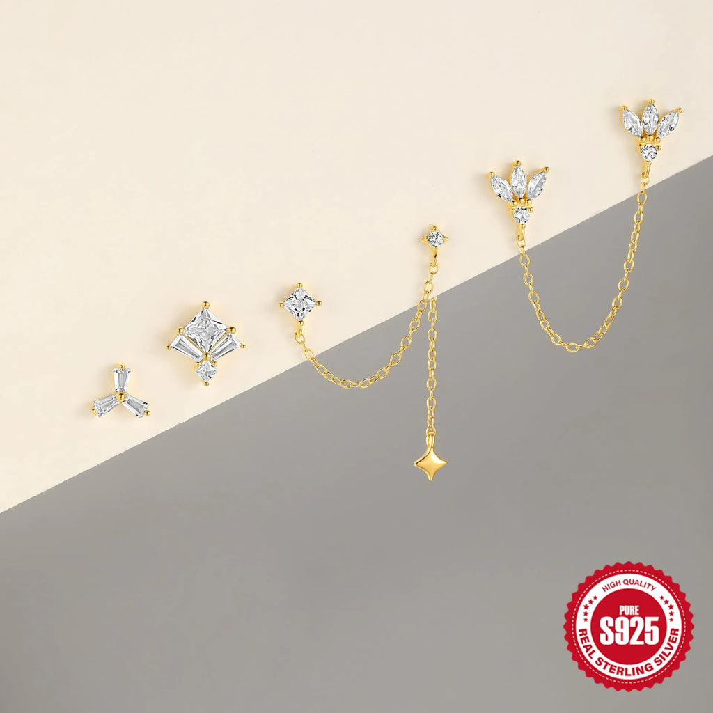 Golden S925 sterling silver earrings with zircon inlay in geometric, clover, crown, and chain styles.