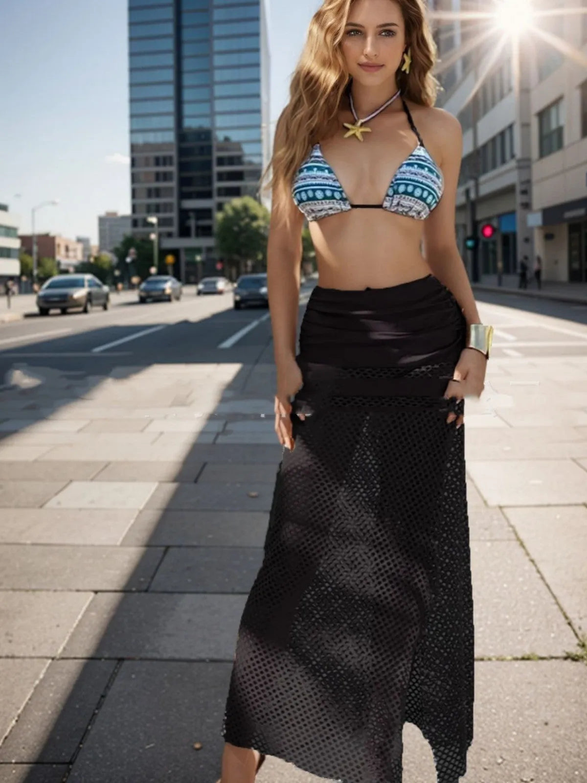Brown gradient women's three-piece bikini set with fishnet long skirt on a mannequin