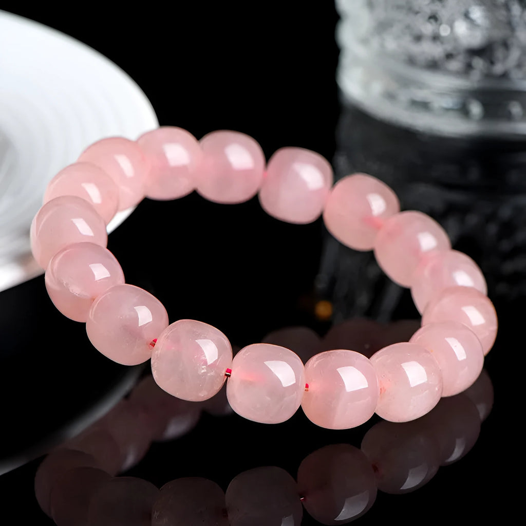 Pink natural crystal barrel bead bracelet with polished 8 x 10mm beads