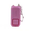 ZQ-202 personal safety alarm in pink, showing compact size and keychain attachment.