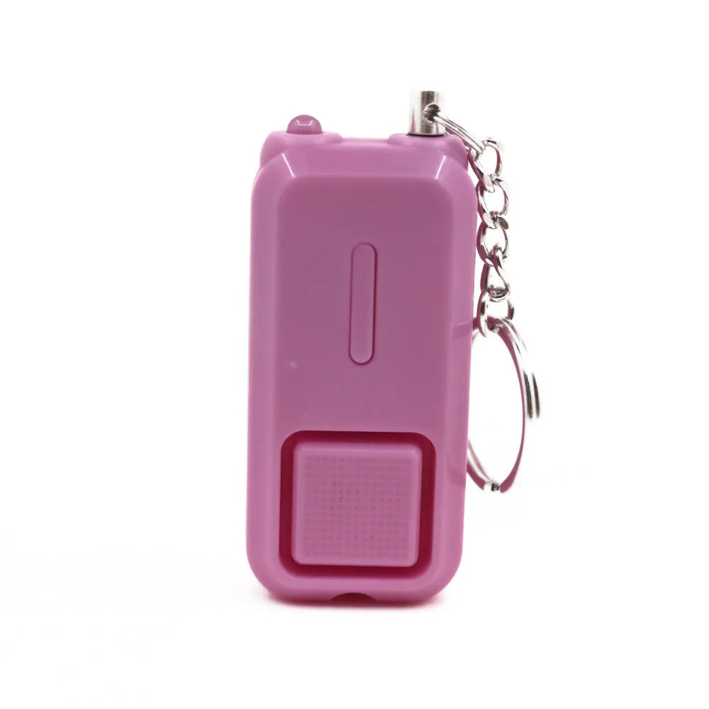 ZQ-202 personal safety alarm in pink, showing compact size and keychain attachment.