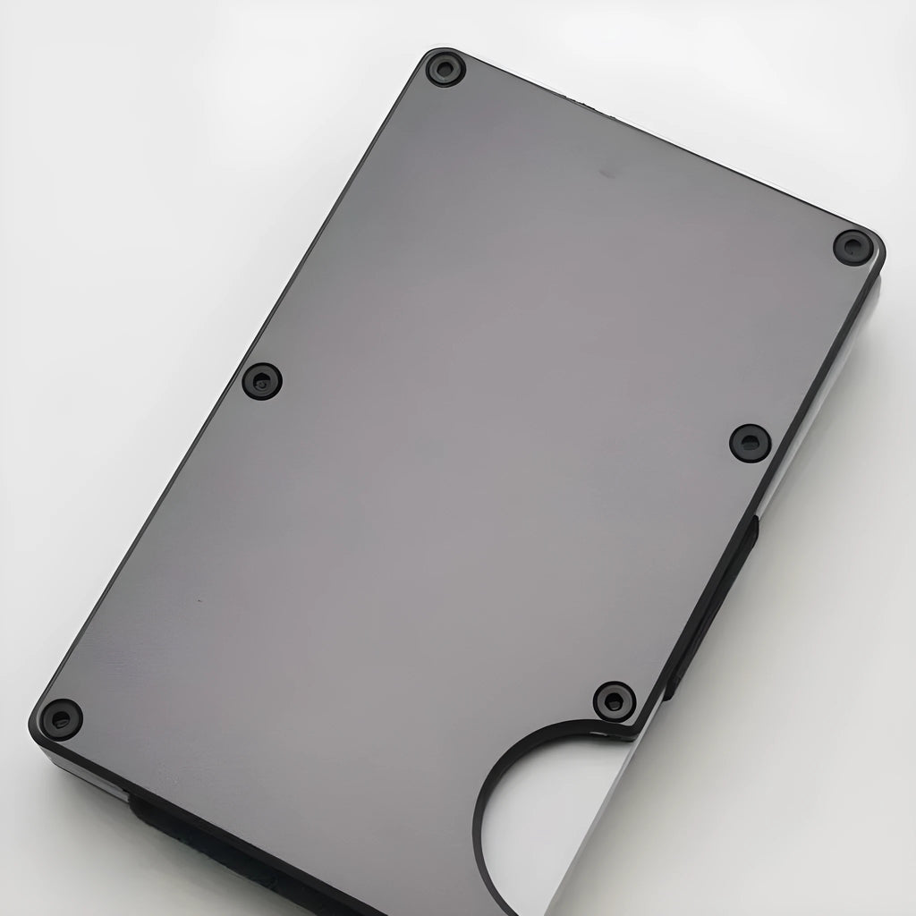 Carbon fibre RFID-blocking wallet with aluminium alloy grey finish showing 7 card slots