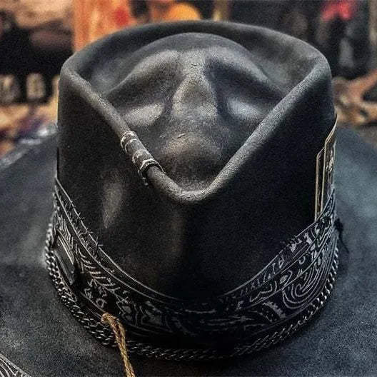 Handmade wool felt skull hat with conical crown showing Halloween design