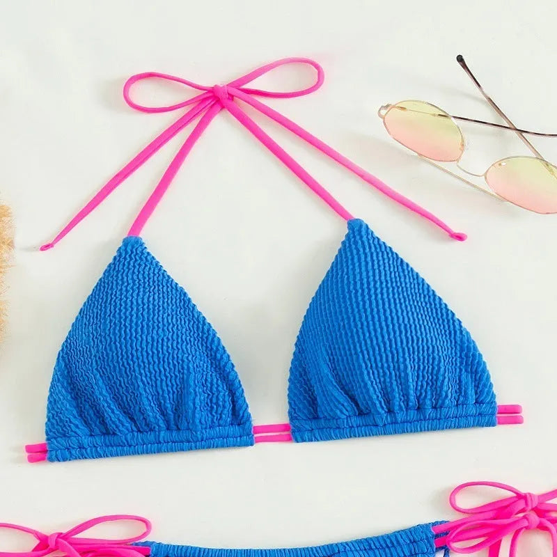Women's lace up nylon swimsuit in solid colour, available in black, blue, light blue, purple, pink, sizes S M L