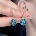 Women's copper zircon earrings with electroplated finish in geometry shapes featuring rose design elements