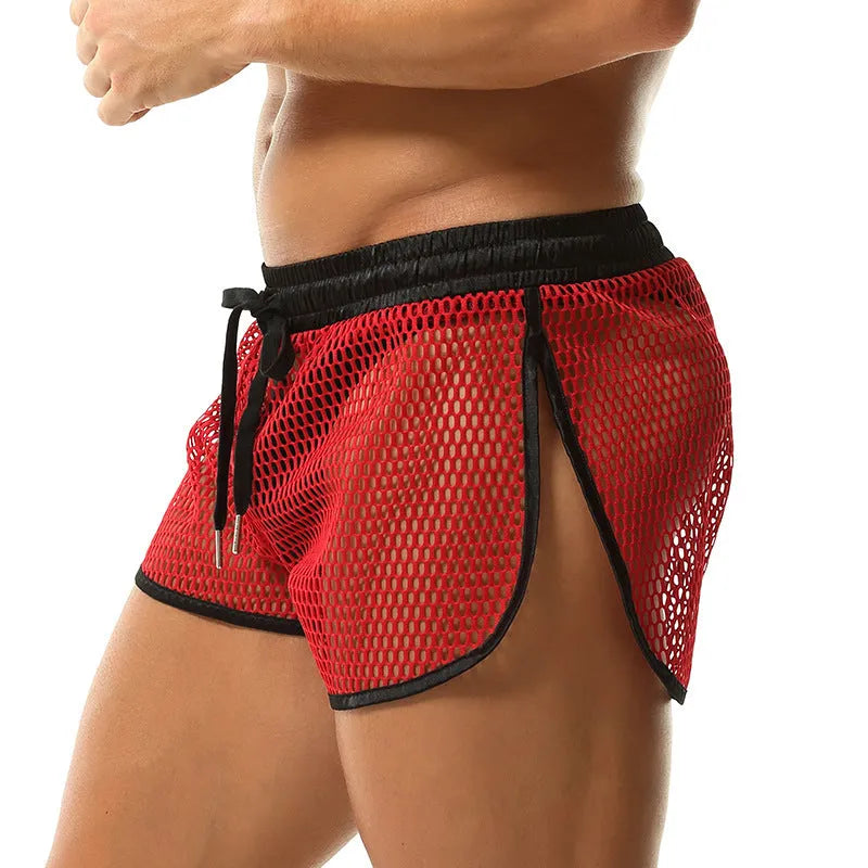 Men's loose breathable polyester boxers in solid colour black, front view on white background