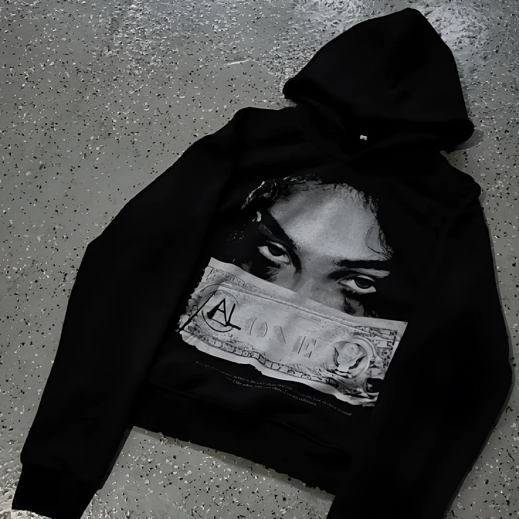 Women's loose fit black polyester hoodie with dark printed cartoon pattern front view