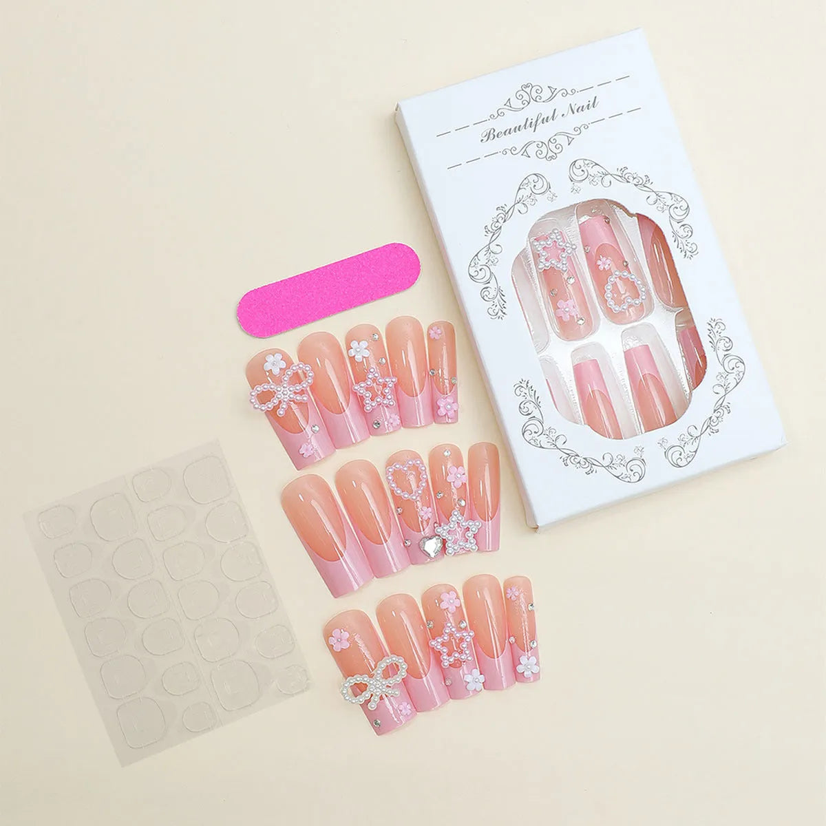 Super long pointed water pipe style false nails with French tip, love heart and bow design in colour XB-70-48.