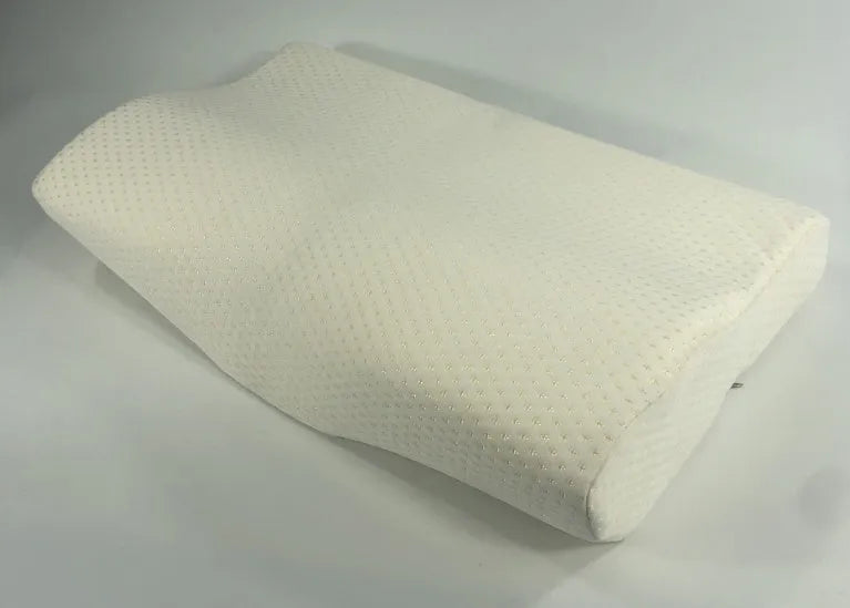 Cervical pillow with memory cotton and butterfly shape in blue, 50x30cm size, on a bed