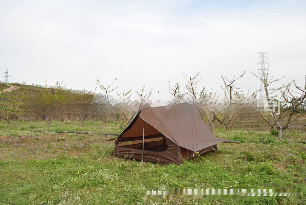 Brown or white A-line pole-free tent pitched with hiking canes showing 210x150x110cm dimensions