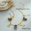 Geometric stainless steel necklace with leopard, heart and flower motifs on 18K electroplated pendant